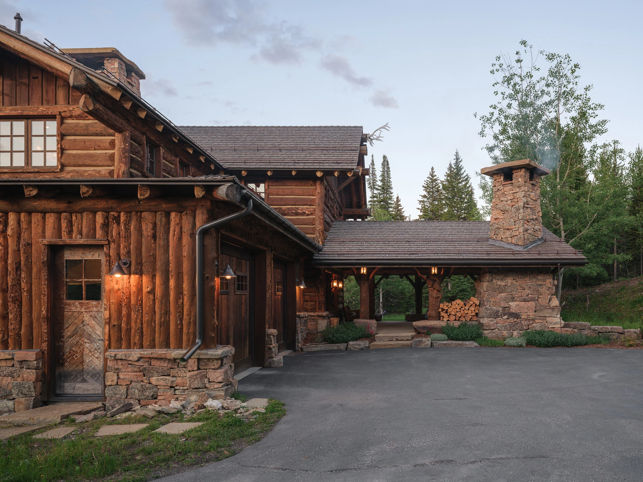 Motor court entry at dusk — architectural photography Big Sky Montana, Club Ridge